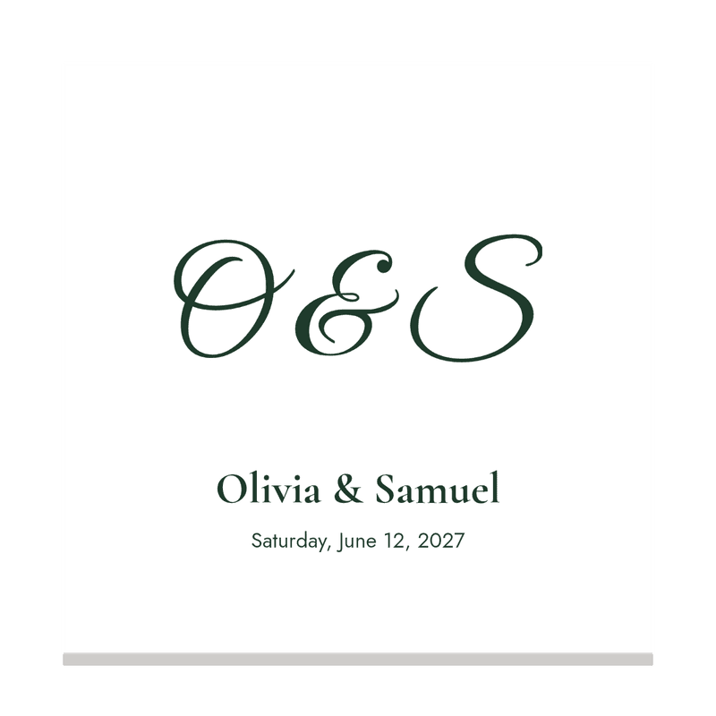 A white cocktail napkin with the couple's monogram, names and date in forest green