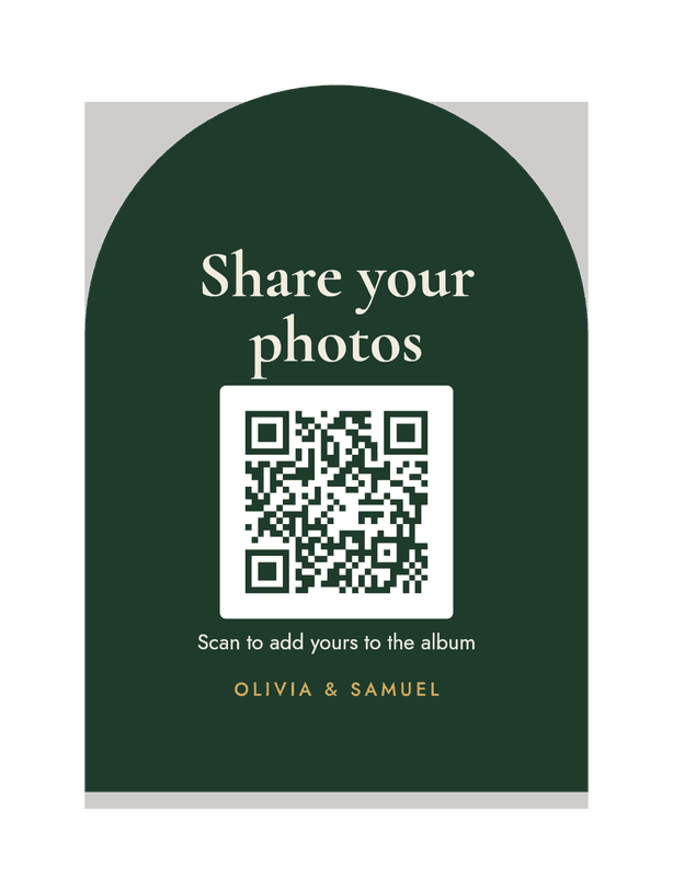 An arched acrylic table sign asking guests to share their photos, with a QR code