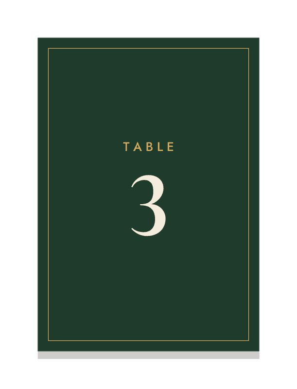 A table number card reading Table 3 in the wedding's colors